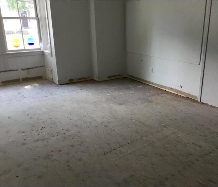 Empty room in a daycare with a subfloor