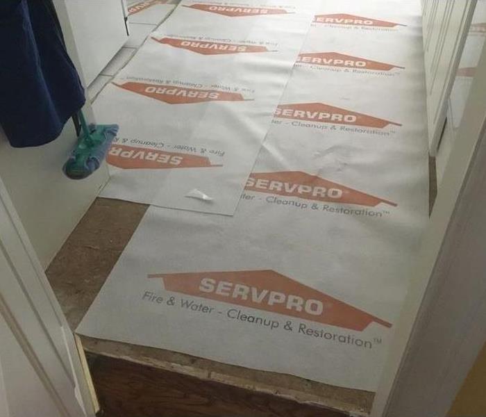 SERVPRO floor protector sheets on carpet 